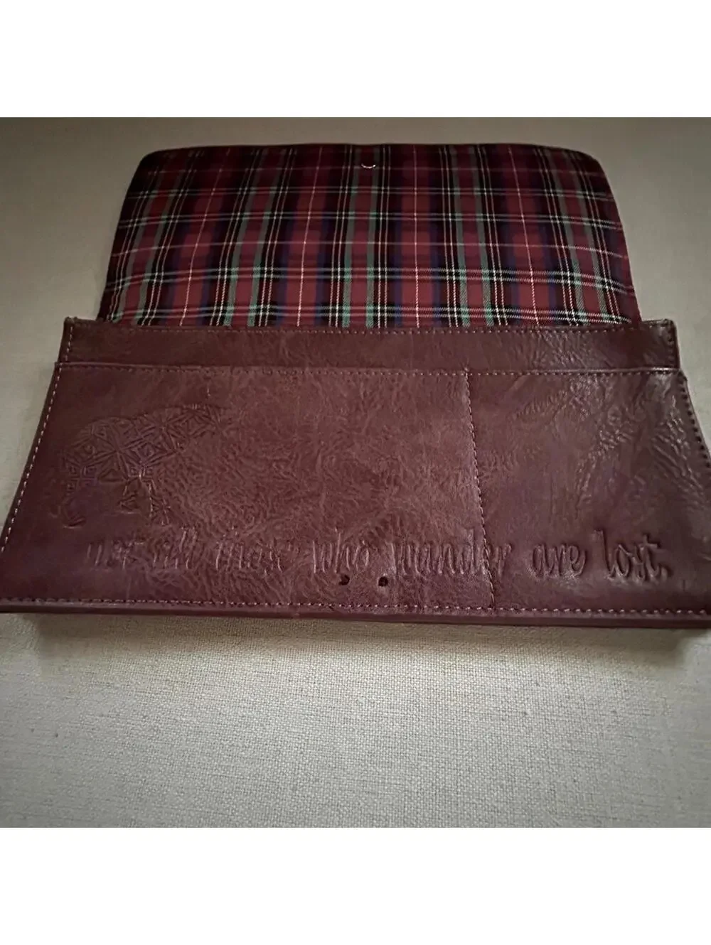 Vintage Wanderlust burgundy leather passport / travel wallet with plaid lining.